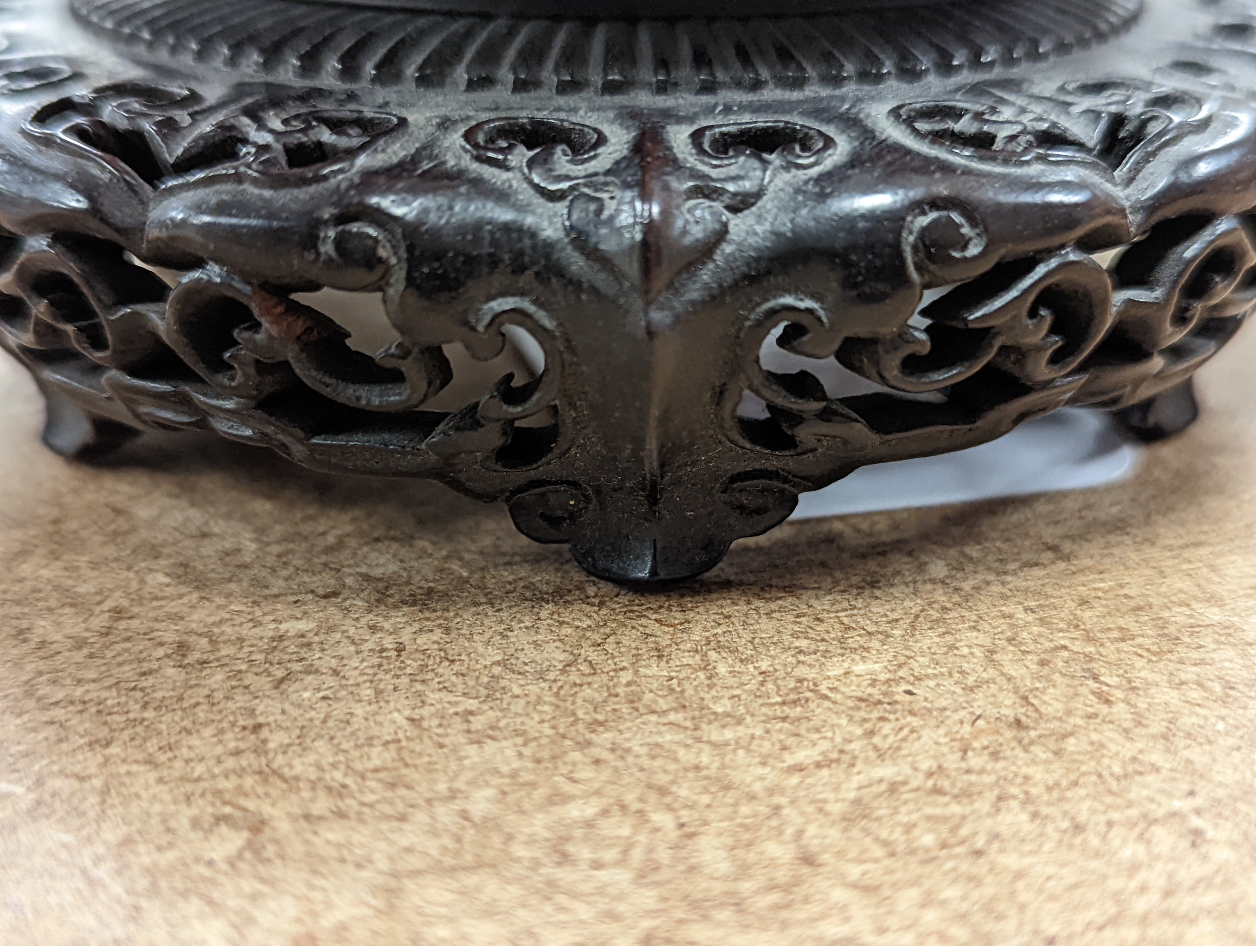 A fine 19th century Chinese hardwood stand, 11.4cm diameter